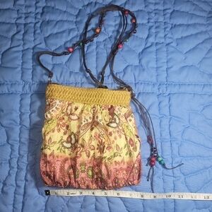 BOHO style small cross body purse with beads on strap and accents.